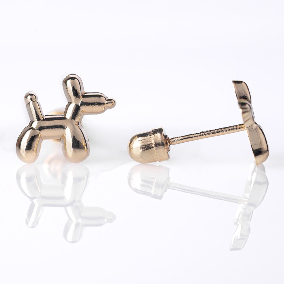Fotografía de producto de aretes de oro para Expresiones Joyería